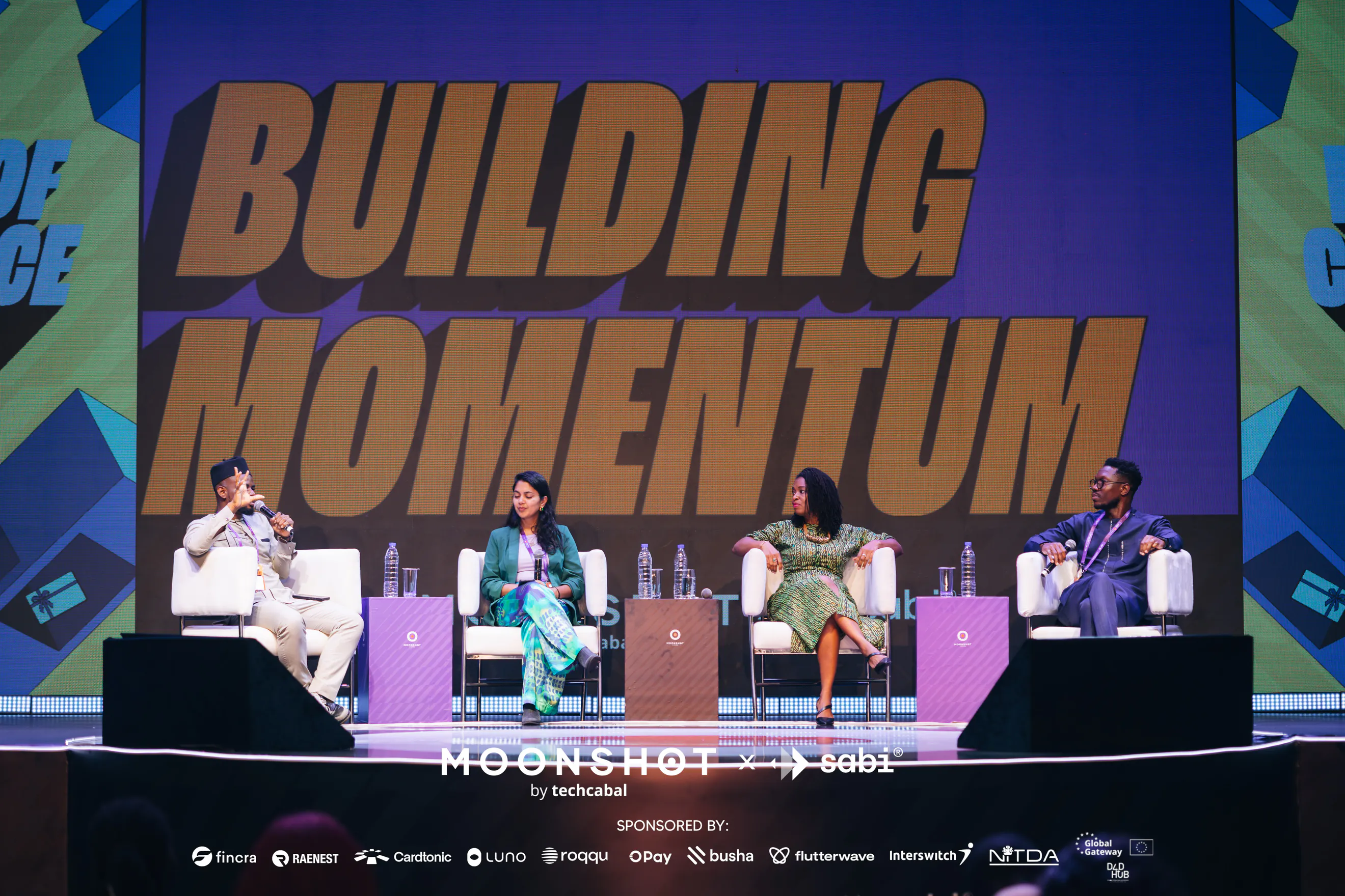 Lola Masha speaking on a conference panel